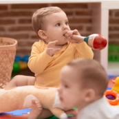Young children playing at Playful Scholars preschool in Midland, promoting nurturing and curiosity-driven learning.